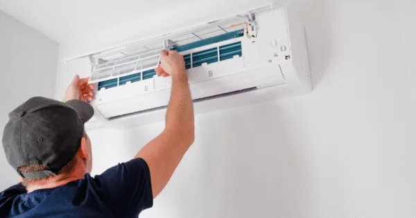 A man is upgrading air conditioning.