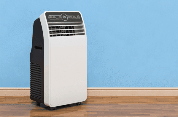 Portable AC is standing in the floor of room