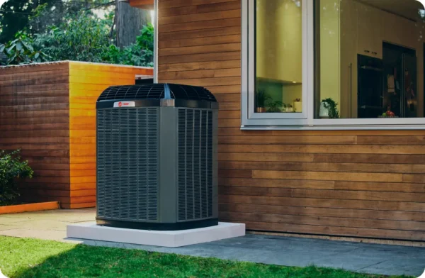 AC system is installed outside beach home.