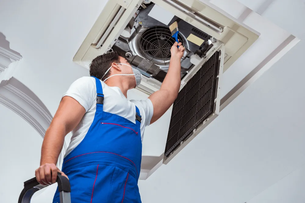 DEEPCHILL technician providing air conditioning repair service.