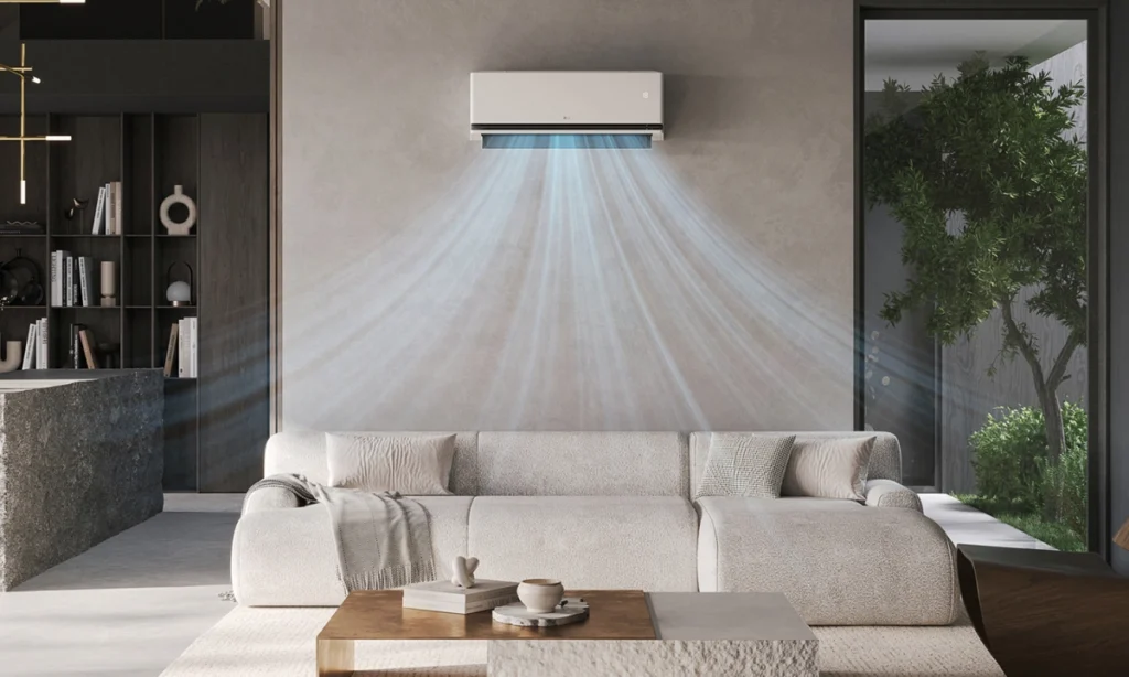 LG DualCool AI Air conditioner in action, releasing cool air evenly across a stylish living room with a neutral-toned sofa and floor-to-ceiling glass windows.