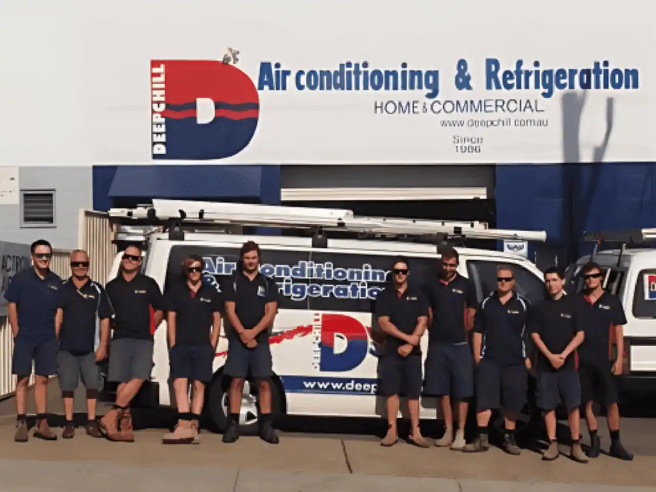 DEEPCHILL technicians team of air conditioning and refrigeration services, standing in front of service vans at the company’s Gold Coast facility.