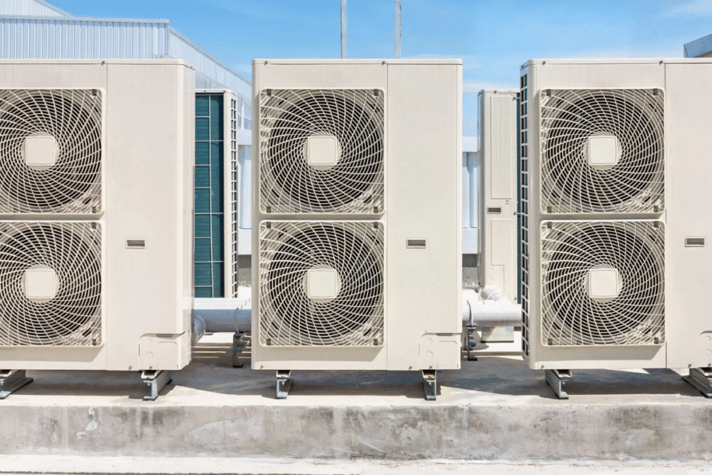 Row of rooftop VRF outdoor units offering centralised cooling and heating – VRF Vs Split system analysis for DEEPCHILL review and air conditioning Gold Coast.