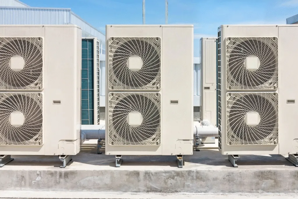 Row of rooftop VRF outdoor units offering centralised cooling and heating – VRF Vs Split system analysis for DEEPCHILL review and air conditioning Gold Coast.