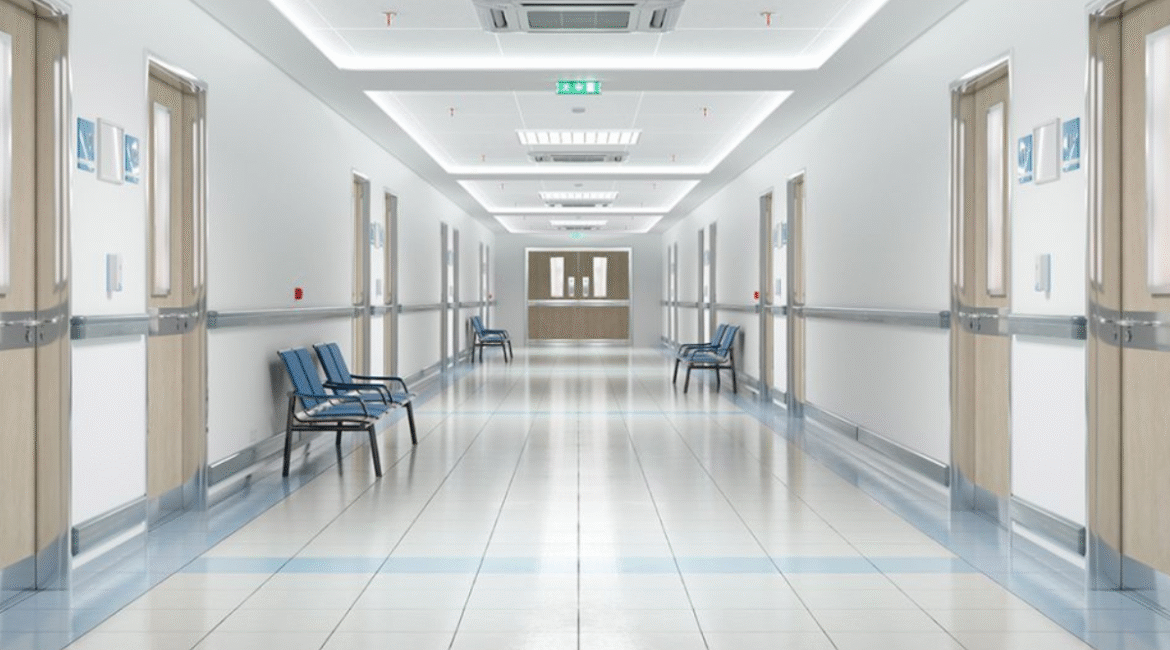 Hospital corridor featuring ceiling-mounted air conditioners – demonstrating effective air conditioning systems for hospitals in winter.