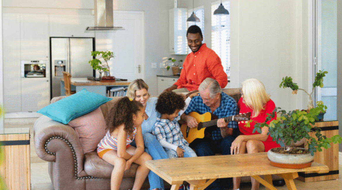 The family is standing in the center of living room