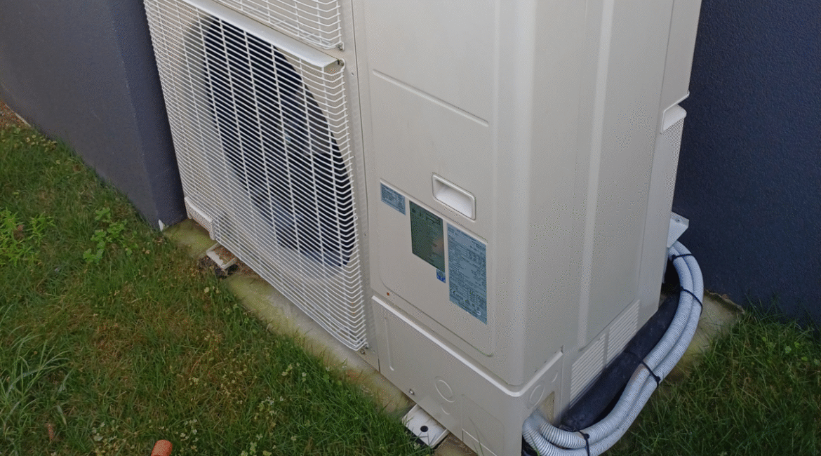 Outdoor air conditioning system protected through vermin treatment and pest prevention, supported by preventative maintenance and air conditioning service Gold Coast.