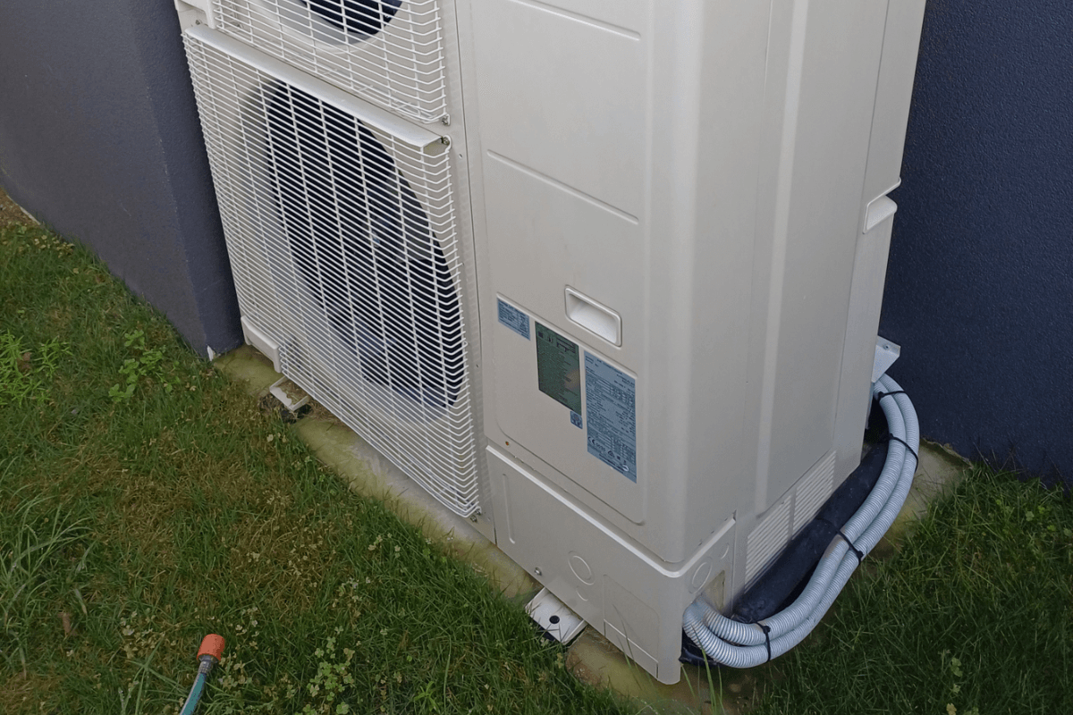 Outdoor air conditioning system protected through vermin treatment and pest prevention, supported by preventative maintenance and air conditioning service Gold Coast.