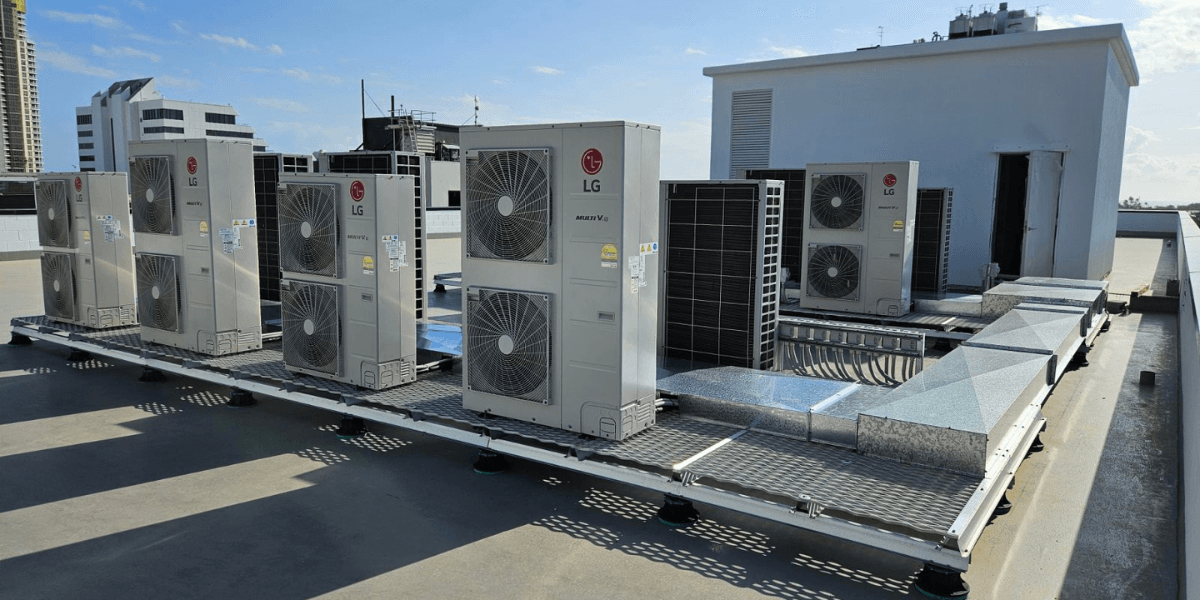 Commercial rooftop LG units installed for air conditioning Gold Coast buildings, highlighting how AC is using too much electricity without proper maintenance.