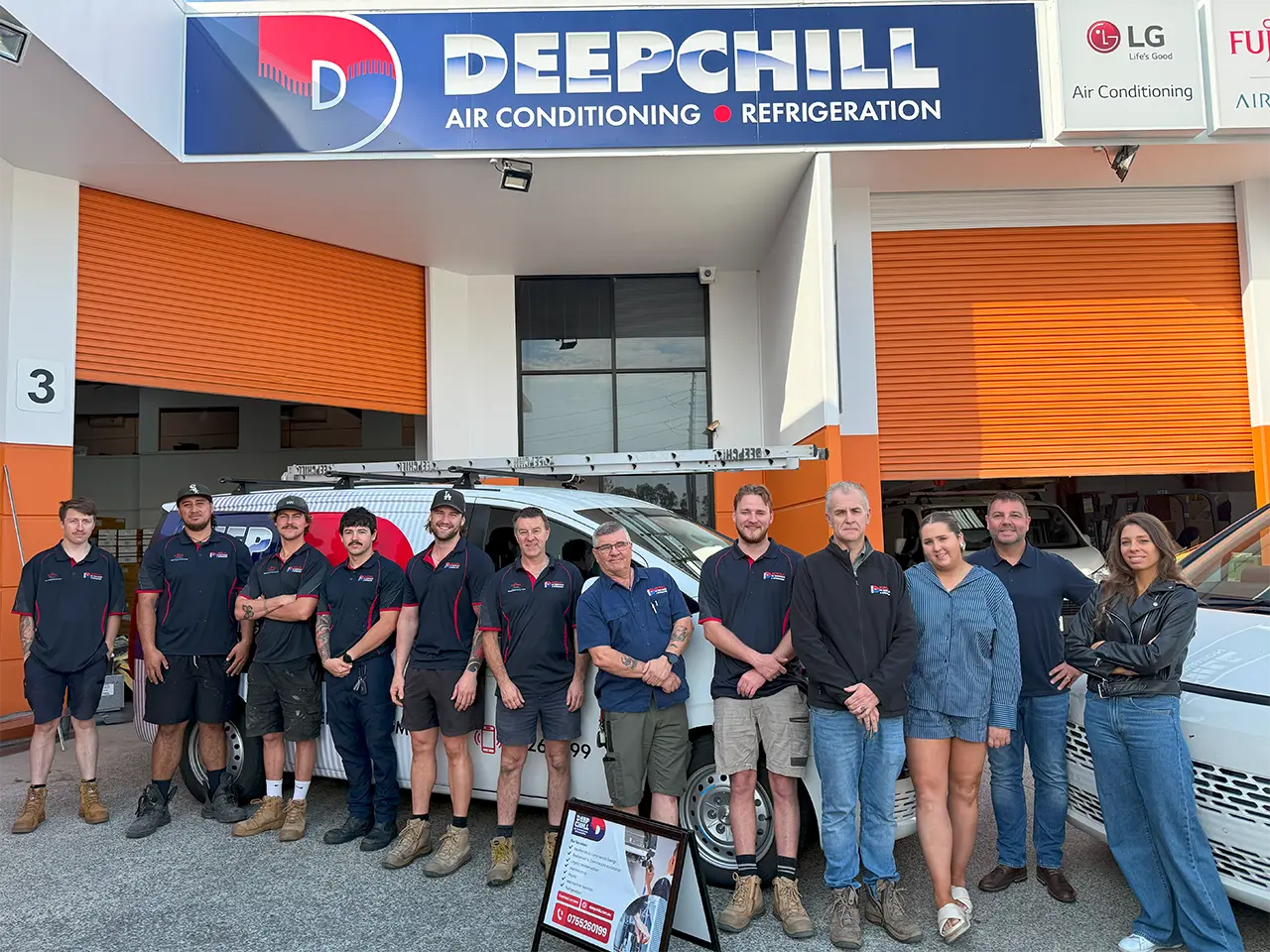 DEEPCHILL technicians team of air conditioning and refrigeration services, standing in front of service vans at the company’s Gold Coast office.