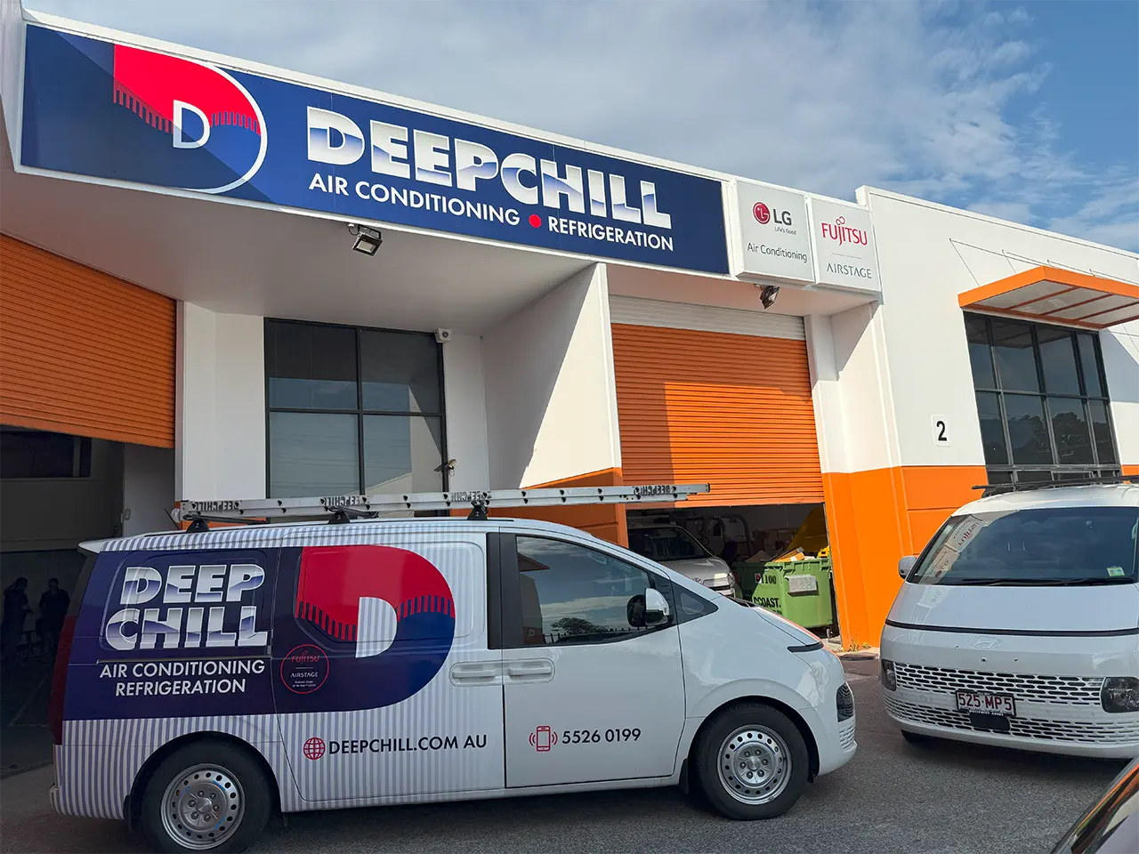 DEEPCHILL office and service vans parked outside DEEPCHILL headquarters.