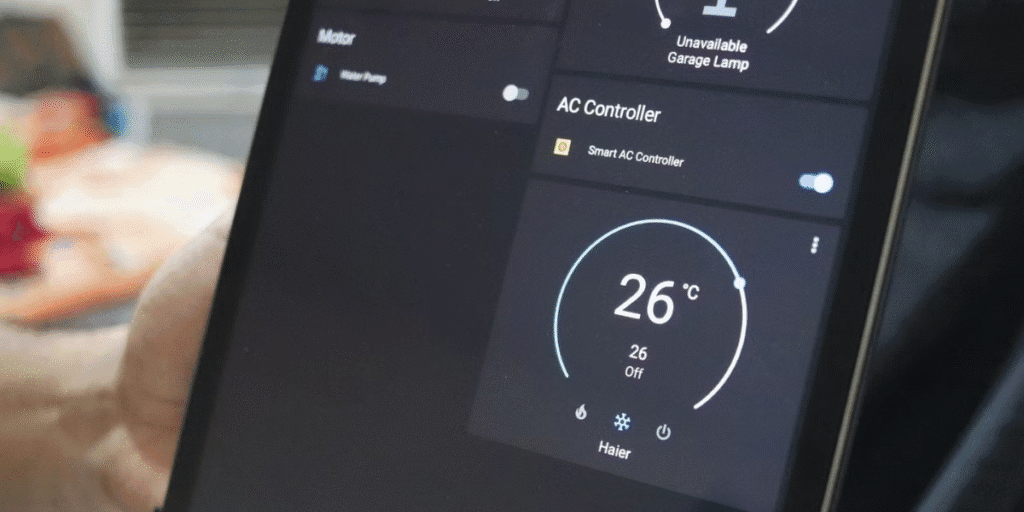 Smart AC controller displayed on a tablet screen set to 26°C, highlighting modern air conditioning Gold Coast options replacing old air conditioner systems.