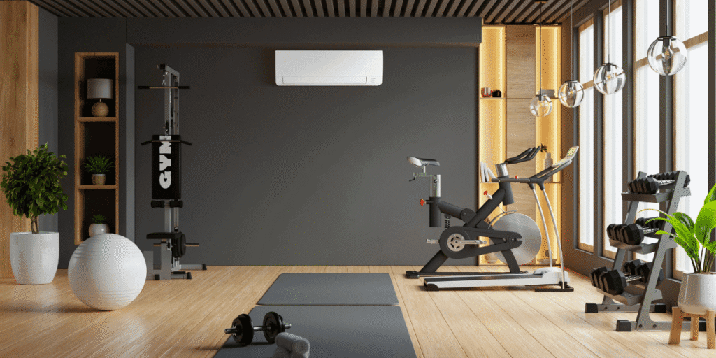 Home workout space with split system cooling, proving air conditioners fit gyms and need professional air conditioning design Gold Coast and installation expertise.