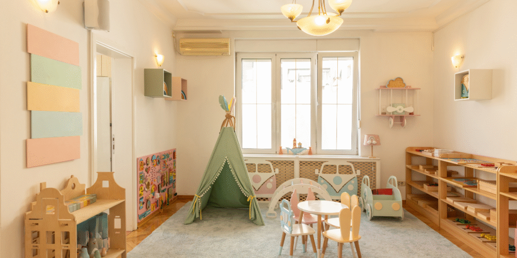 This childcare centre playroom features safe furniture, creative toys, and reliable air conditioning for childcare centres in Gold Coast.