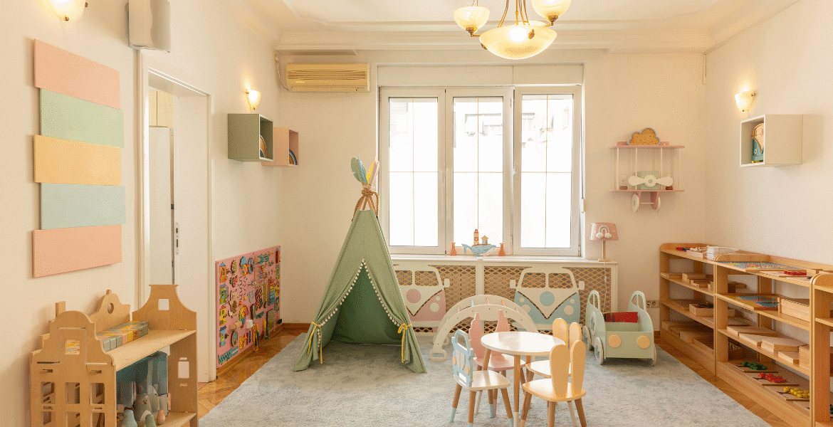 This childcare centre playroom features safe furniture, creative toys, and reliable air conditioning for childcare centres in Gold Coast.