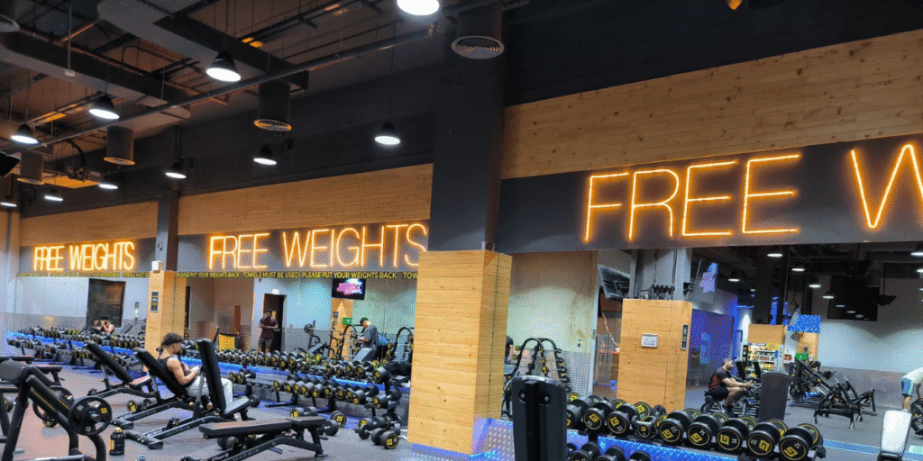 Free weights zone in a gym where air conditioning in gyms keeps temperatures stable, protecting members’ health with support from air conditioning Gold Coast experts.