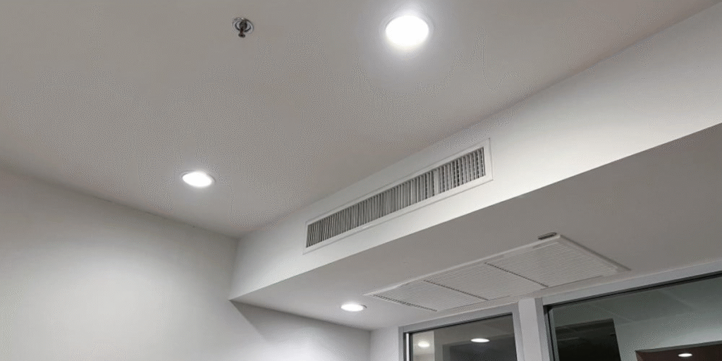 Ceiling ducted system showing compliance with air conditioning regulations, highlighting clean airflow and safe installation for air conditioning Gold Coast.