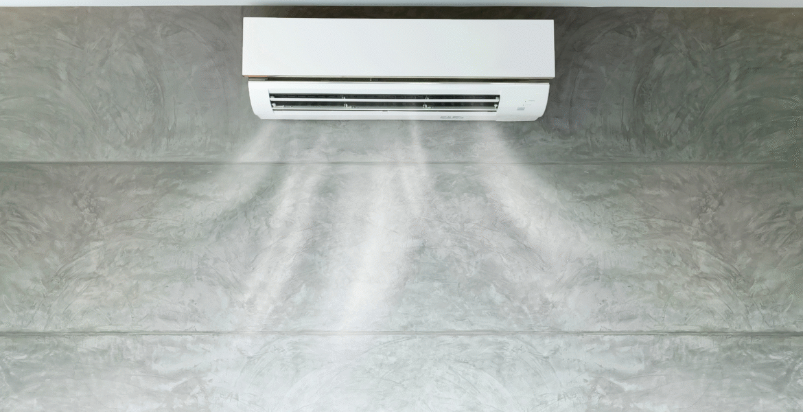 Indoor air conditioning unit releasing hot air into the room, showing signs that the ac starts blowing hot air and may require expert air conditioning Gold Coast inspection or repair service.