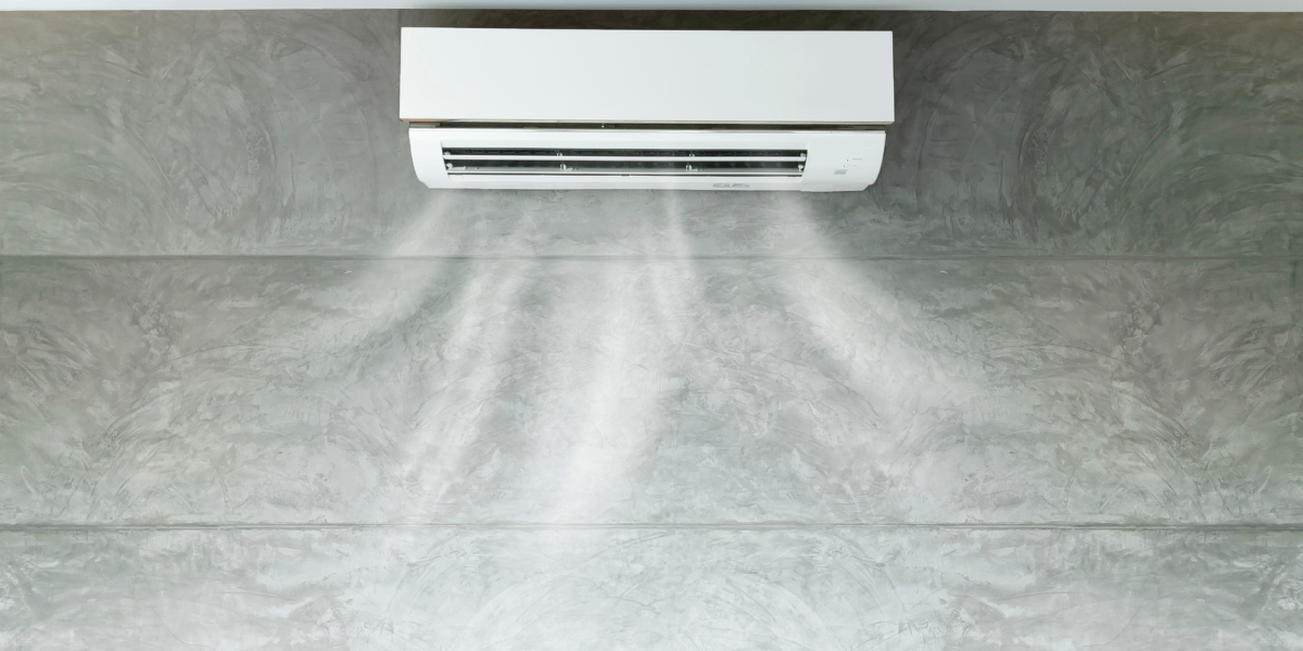 Indoor air conditioning unit releasing hot air into the room, showing signs that the ac starts blowing hot air and may require expert air conditioning Gold Coast inspection or repair service.
