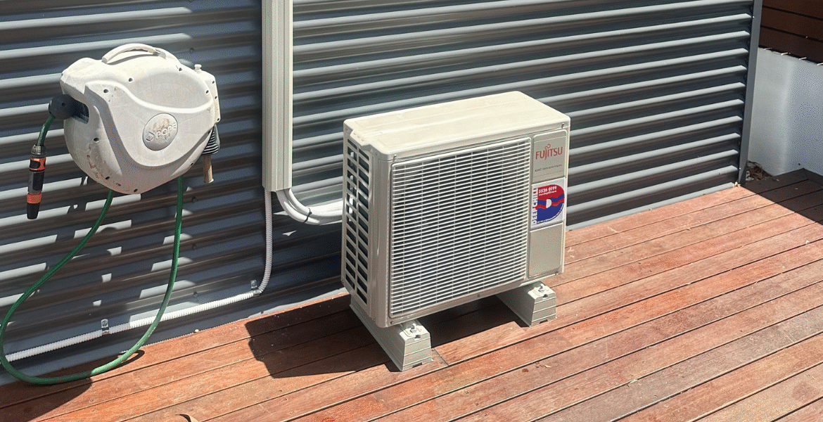Fujitsu outdoor unit not running — compact DC Inverter system installed on timber deck, maintained by DEEPCHILL air conditioning Gold Coast specialists.