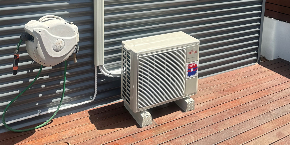 Fujitsu outdoor unit not running — compact DC Inverter system installed on timber deck, maintained by DEEPCHILL air conditioning Gold Coast specialists.