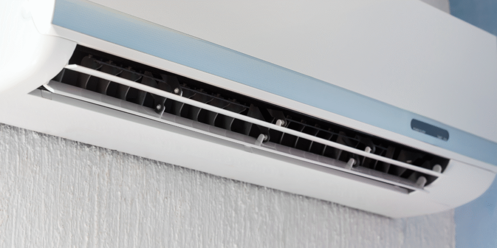 A close-up of an indoor wall-mounted unit showing the air conditioner not cooling during the day, often seen in homes needing professional air conditioning Gold Coast maintenance.