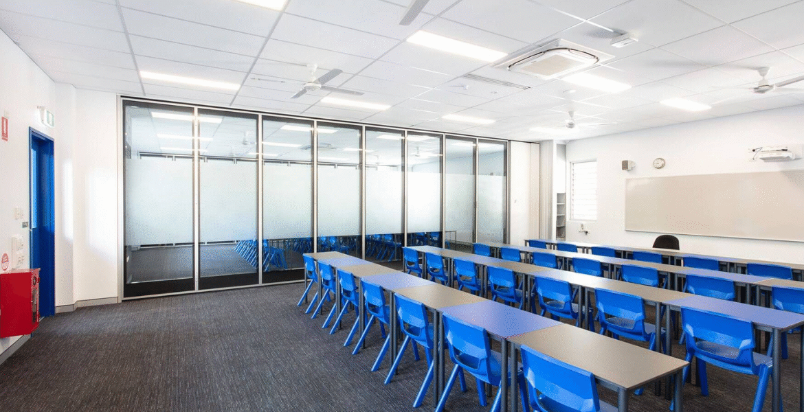 Modern high school classroom equipped with efficient air conditioning Gold Coast system — proving cool classrooms close learning gap and support better exam performance.