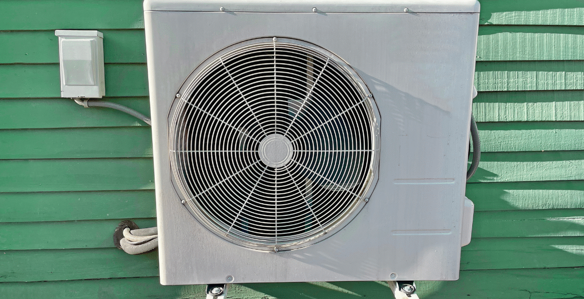 Outdoor air conditioning unit working hard to run AC during the heat wave on a Gold Coast home, maintained by professional air conditioning Gold Coast services.