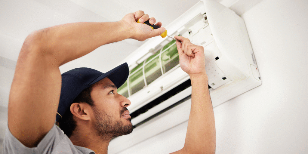 DEEPCHILL’s preventative maintenance for residential air conditioning Gold Coast, with a technician inspecting internal components to ensure safe and reliable operation.