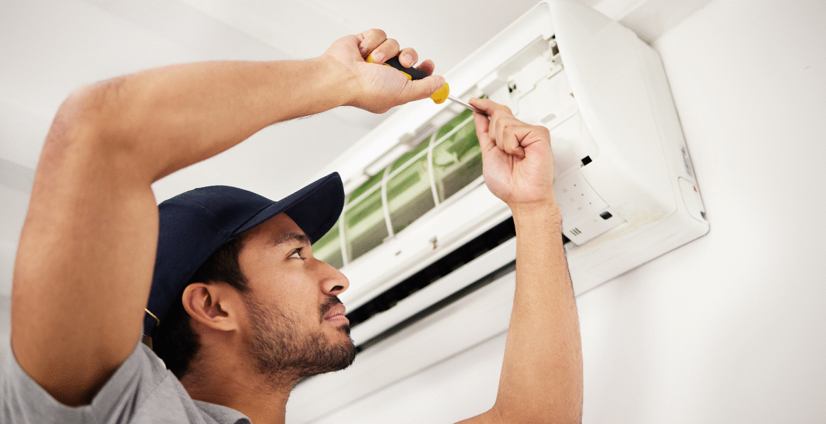 DEEPCHILL’s preventative maintenance for residential air conditioning Gold Coast, with a technician inspecting internal components to ensure safe and reliable operation.