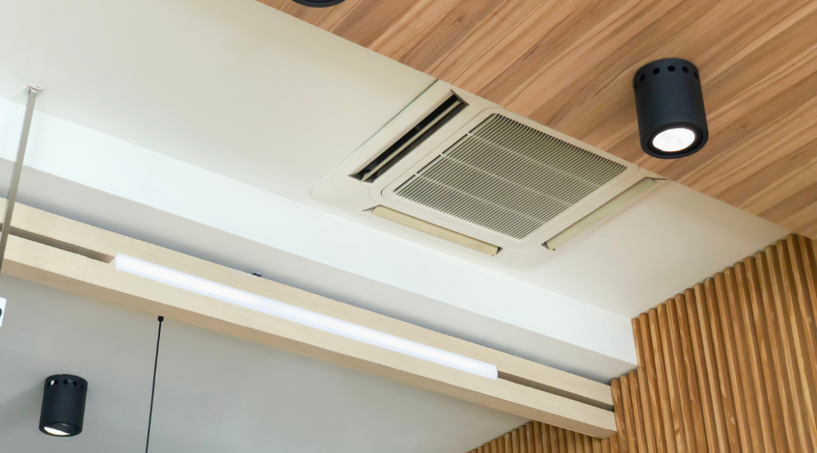 After New Year check for commercial air conditioning Gold Coast, featuring a ceiling cassette system in a modern commercial interior.