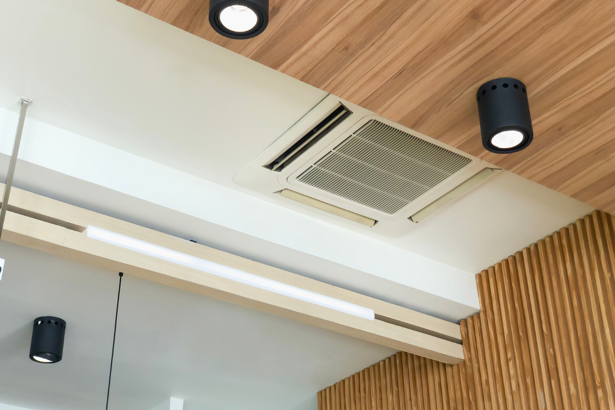 After New Year check for commercial air conditioning Gold Coast, featuring a ceiling cassette system in a modern commercial interior.
