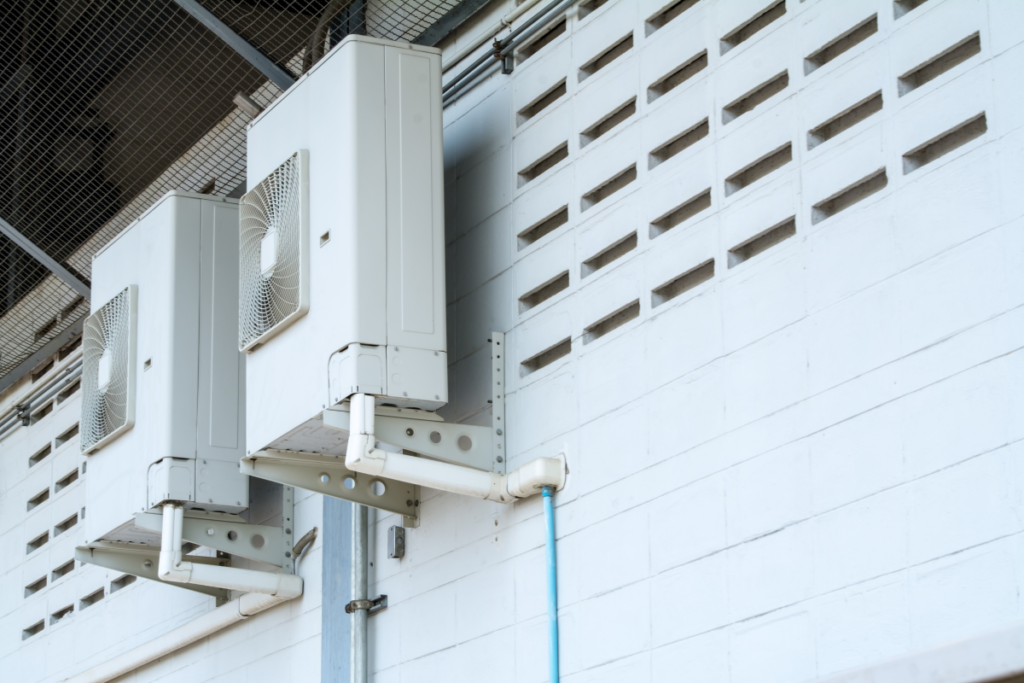 Poorly ventilated outdoor air conditioning units that may increase the risk of refrigerant poisoning in commercial air conditioning Gold Coast buildings.