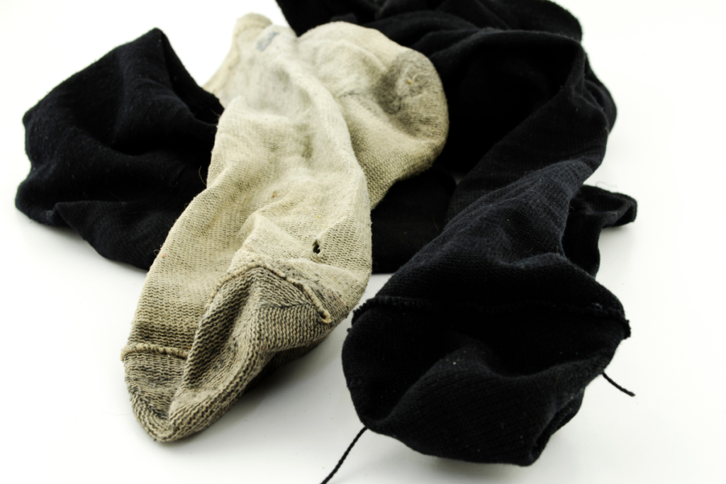 Dirty socks used to illustrate the musty smell associated with dirty sock syndrome in air conditioning Gold Coast homes.