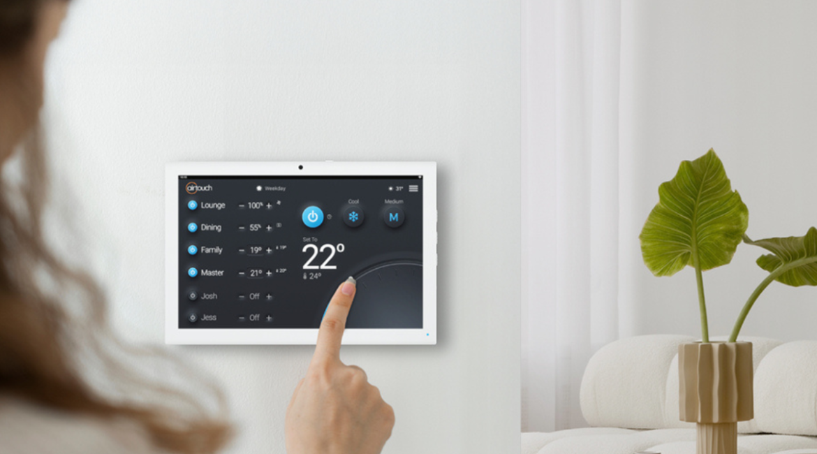 Wall-mounted smart control manage heatwaves by optimising air conditioning settings for comfort and energy savings in commercial air conditioning Gold Coast and residential spaces.