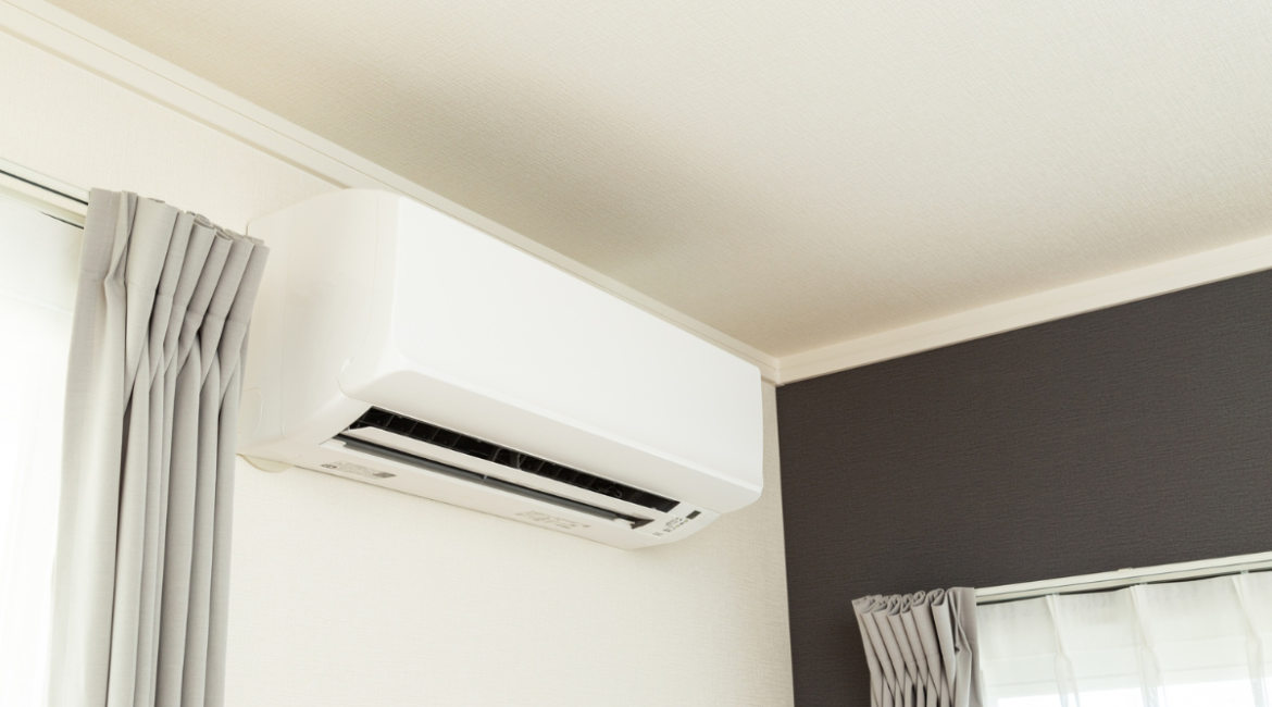 Air conditioner starts normally then stops inside a residential bedroom, showing wall-mounted unit that may turn on and off repeatedly, residential air conditioning Gold Coast