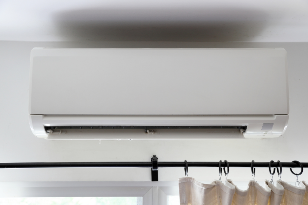 Still leaking water after cleaning from a wall-mounted air conditioner, a common issue in residential and commercial air conditioning Gold Coast systems.