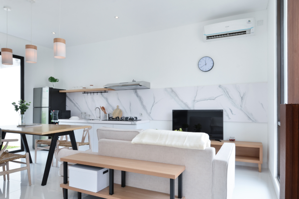 A modern home with residential air conditioning Gold Coast creating a cool indoor environment that may contribute to summer cold symptoms if misused.