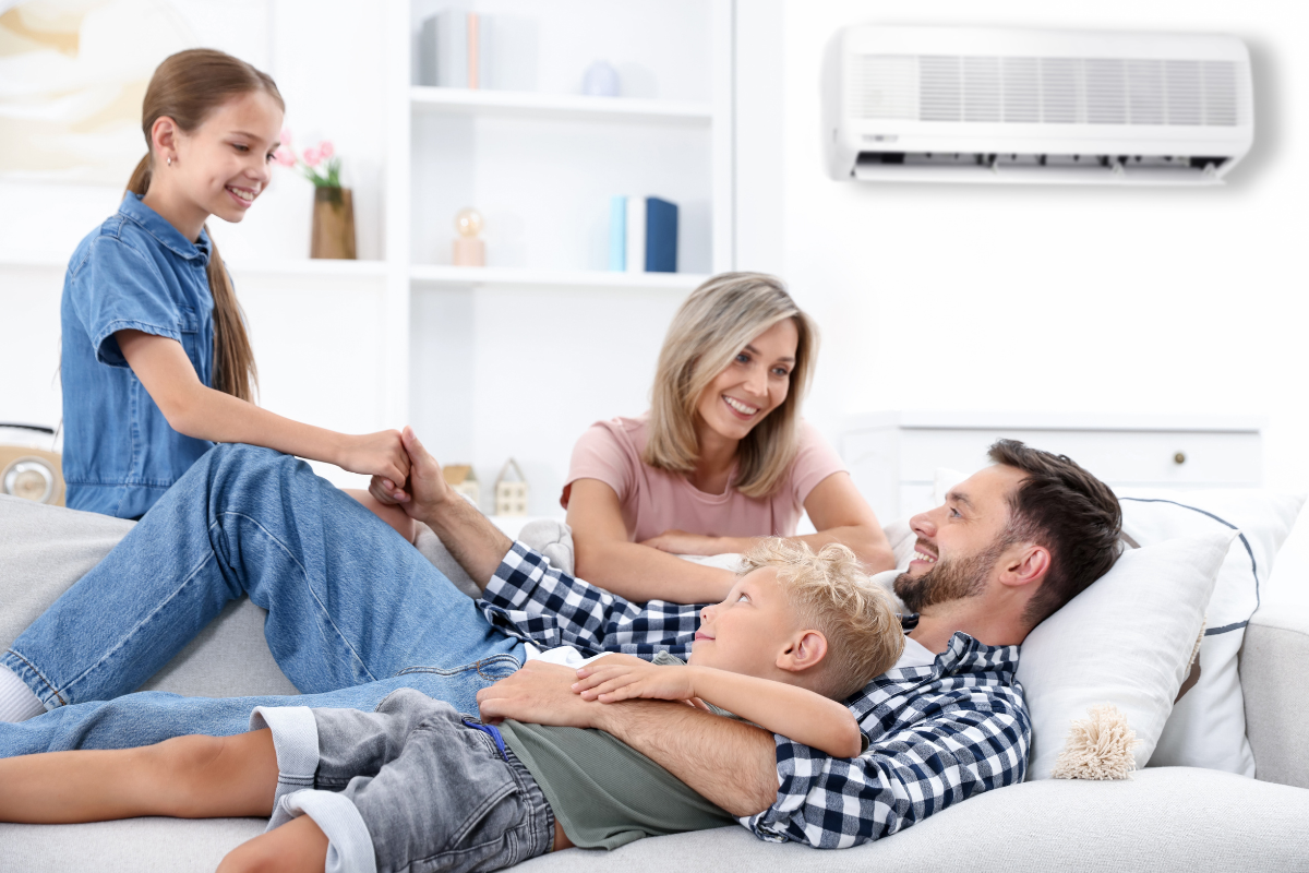 Air conditioning in autumn helping a Gold Coast family stay comfortable indoors during cooler evenings, answering the question: do you still need air conditioning in autumn on the Gold Coast?