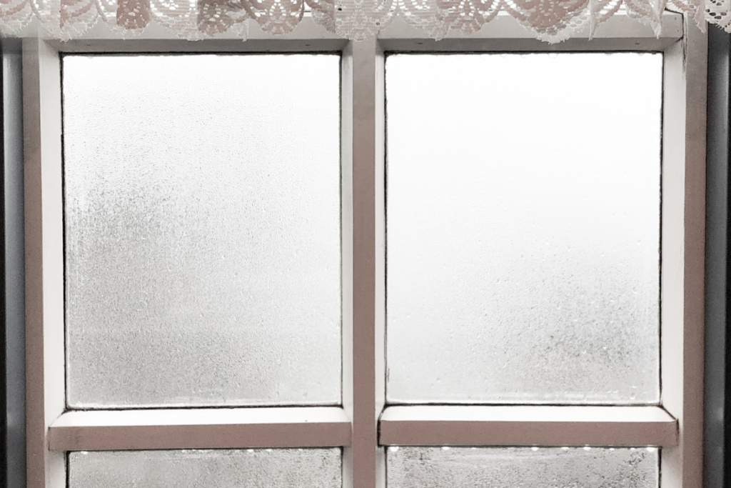 Humidity in house causing condensation on window glass even with AC on – air conditioning Gold Coast indoor moisture issue.