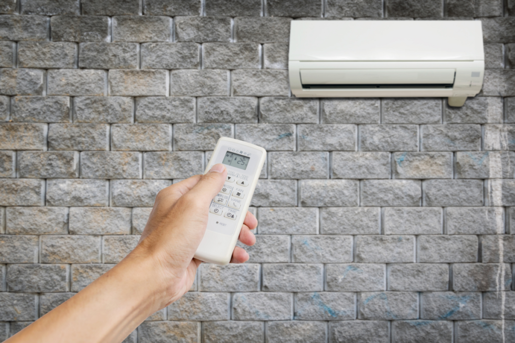 AC not cooling well on humid days while adjusting remote, air conditioning Gold Coast system struggling with humidity