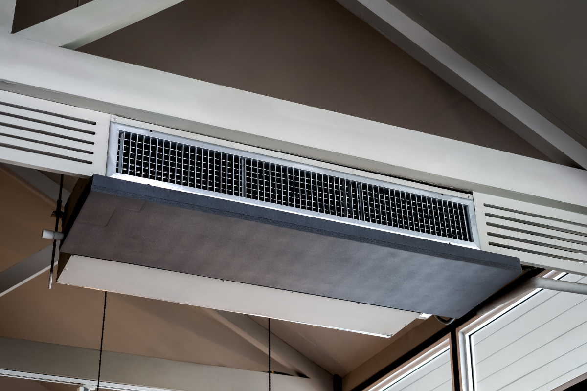 High-capacity ceiling-mounted vent system designed for commercial air conditioning Gold Coast businesses, utilizing AI air conditioning technology to optimize airflow in large spaces.