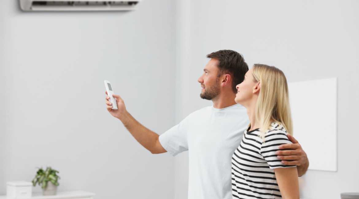 A happy couple enjoying the benefits of Panasonic Humidity Sensor Tech through their residential air conditioning Gold Coast installation.