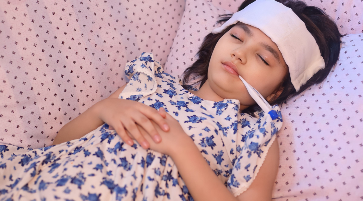 A child with a fever sleeping peacefully with a cold compress on her forehead, resting in a comfortable room maintained by expert air conditioning Gold Coast technicians.