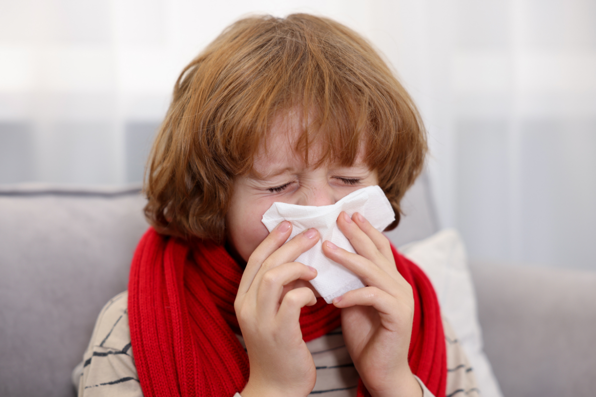 A large ceiling-mounted commercial air conditioning gold coast unit in an office with fluctuating temperatures, which can sometimes worsen nasal congestion. Regular air conditioning gold coast maintenance ensures clean air.