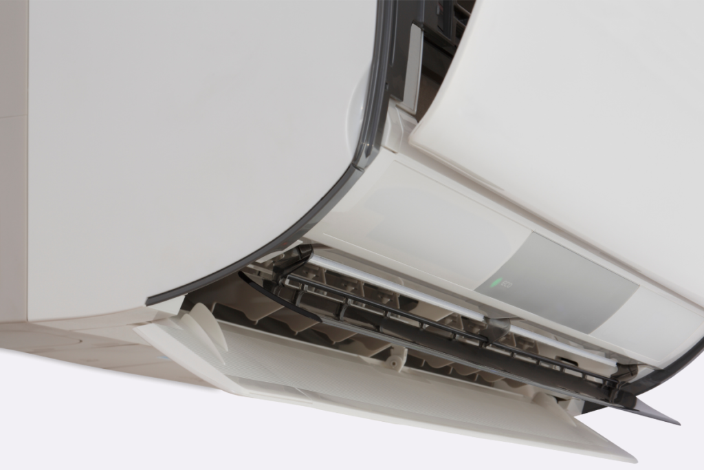 Close-up of a Daikin indoor split system with the vent open, highlighting the precision engineering used in commercial air conditioning Gold Coast and residential systems operating in Daikin Heat Mode.