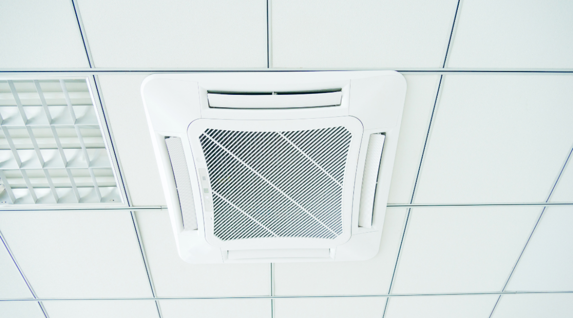 A durable Rinnai outdoor unit installed on a concrete base, featuring energy-efficient Rinnai Heat Mode for high-quality commercial air conditioning Gold Coast setups.