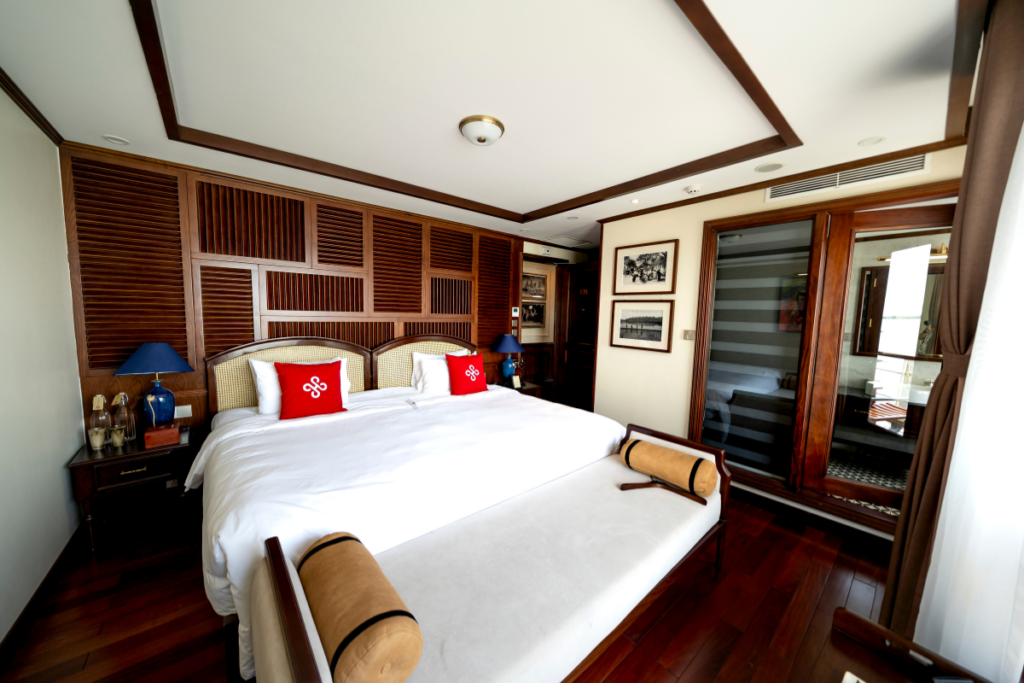 Luxury hotel guest room with ducted air conditioning and timber finishes, showcasing professional hotel HVAC maintenance and commercial air conditioning Gold Coast solutions delivered by a trusted commercial HVAC contractor Gold Coast.