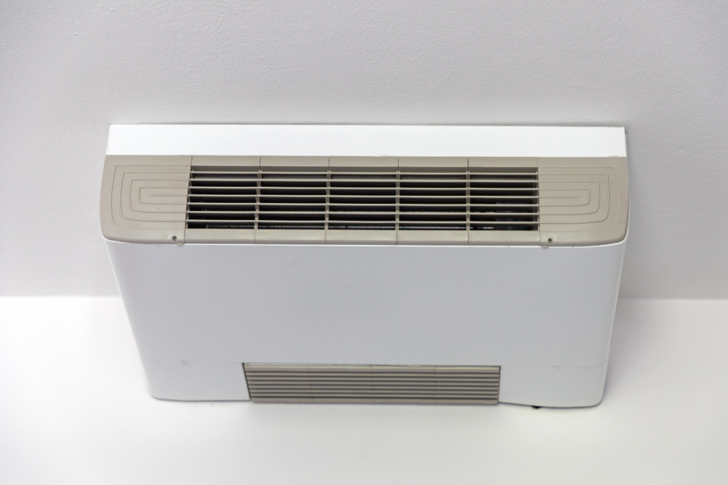 Residential air conditioning Gold Coast wall-mounted split system unit set to heating mode.