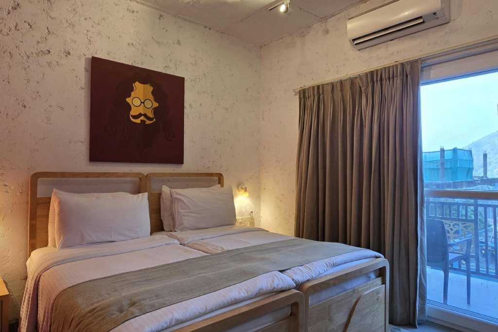 Close-up of a wall-mounted split system air conditioning gold coast unit in a hotel room, showcasing the key hardware checked during hotel HVAC maintenance and winter AC maintenance Gold Coast to prevent any hotel AC not heating emergencies.